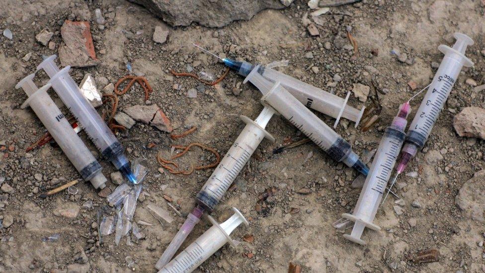 Discarded syringes