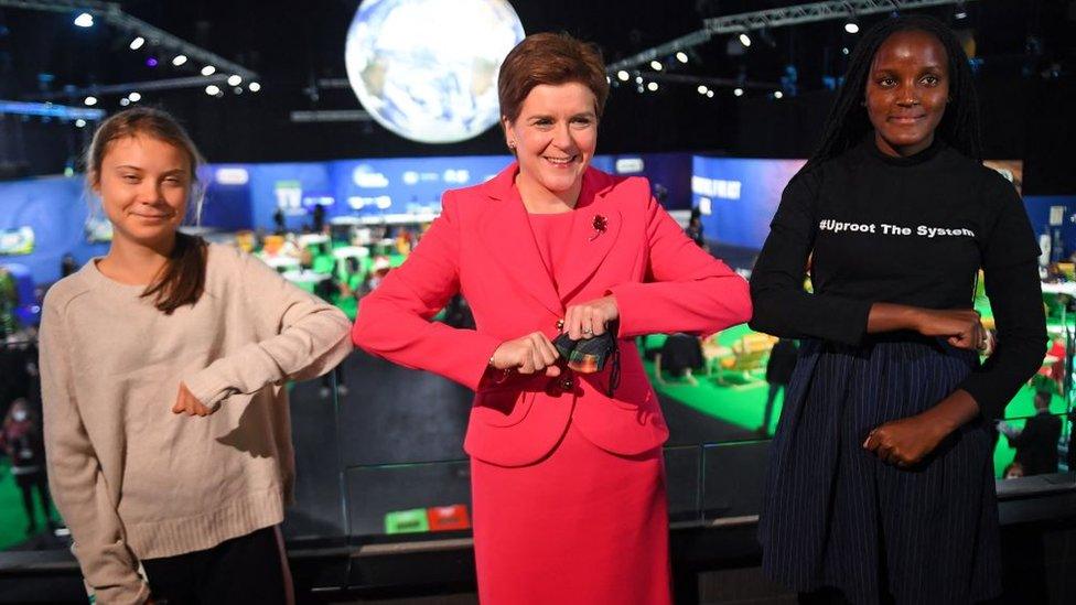 Nicola Sturgeon poses for a photograph during her meeting with climate activists Vanessa Nakate and Greta Thunberg