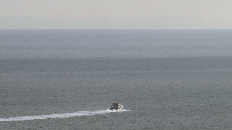 Border Force vessel "Typhoon" heads back on patrol after taking part in a rescue mission in the English Channel in December 2022.