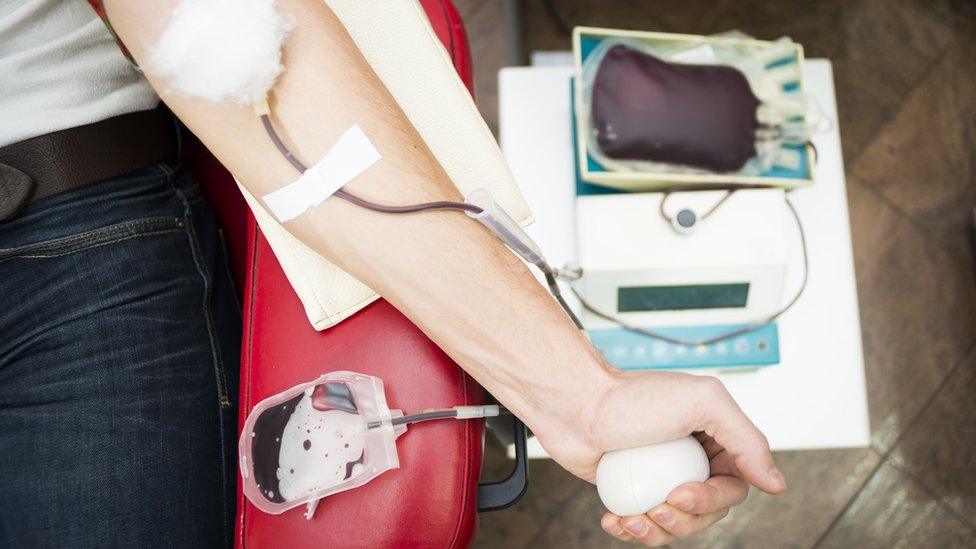 Man giving blood donation