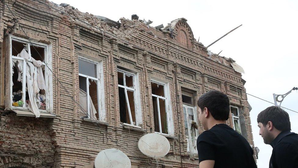 A building damaged by shellfire in Ganja