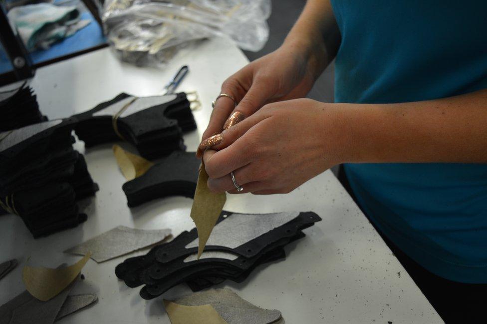 Putting pieces of leather together
