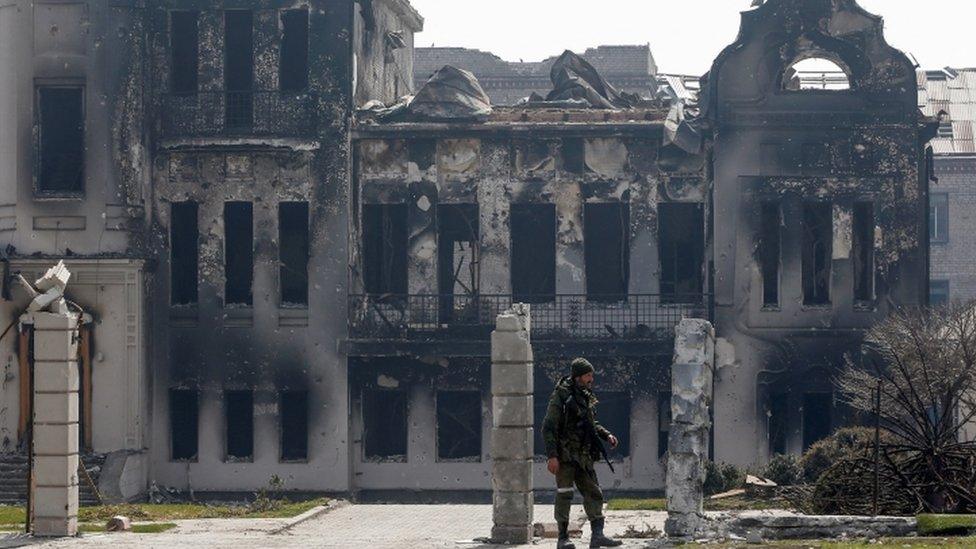 Image shows burnt out building