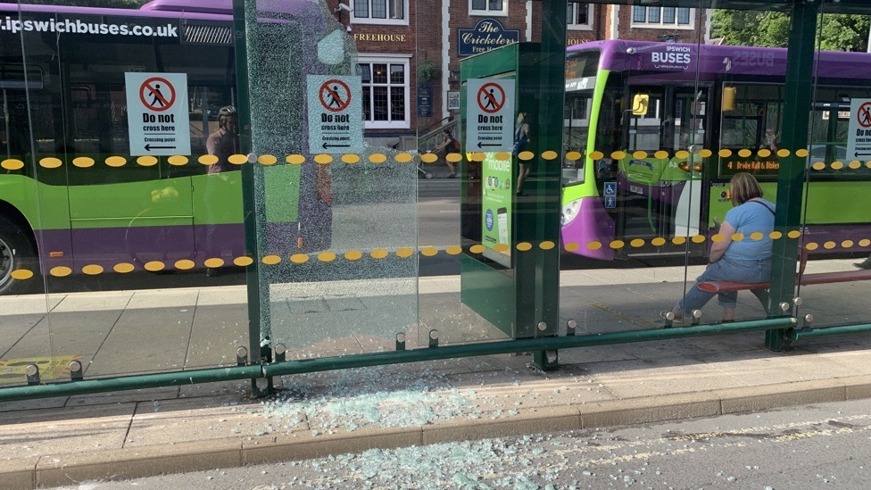 Shattered glass from a stand that broke in the heat at Ipswich Tower Ramparts bus station