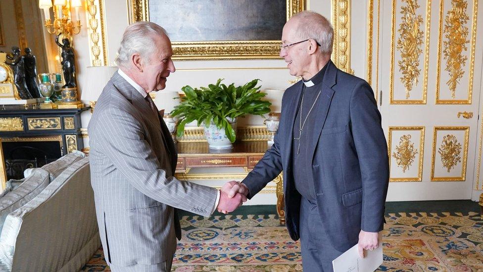 The King shaking hands with the Archbishop of Canterbury, as they meet ahead of the Coronation