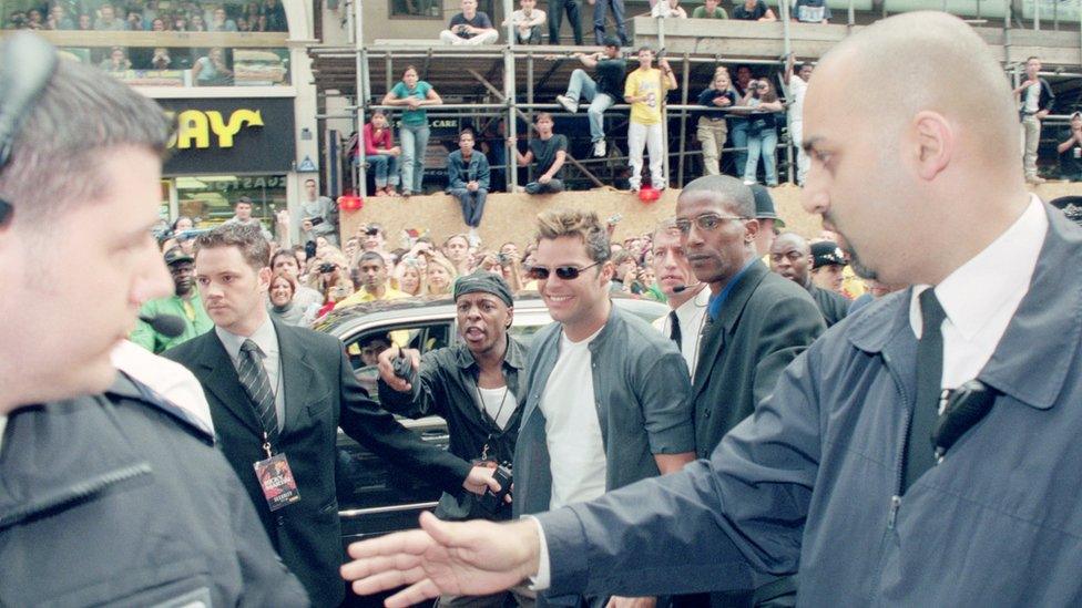 Ricky Martin attends a signing in 1999