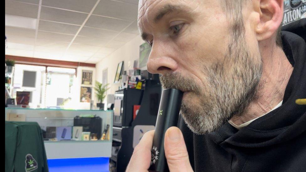 Alan Robinson using a medical cannabis vape