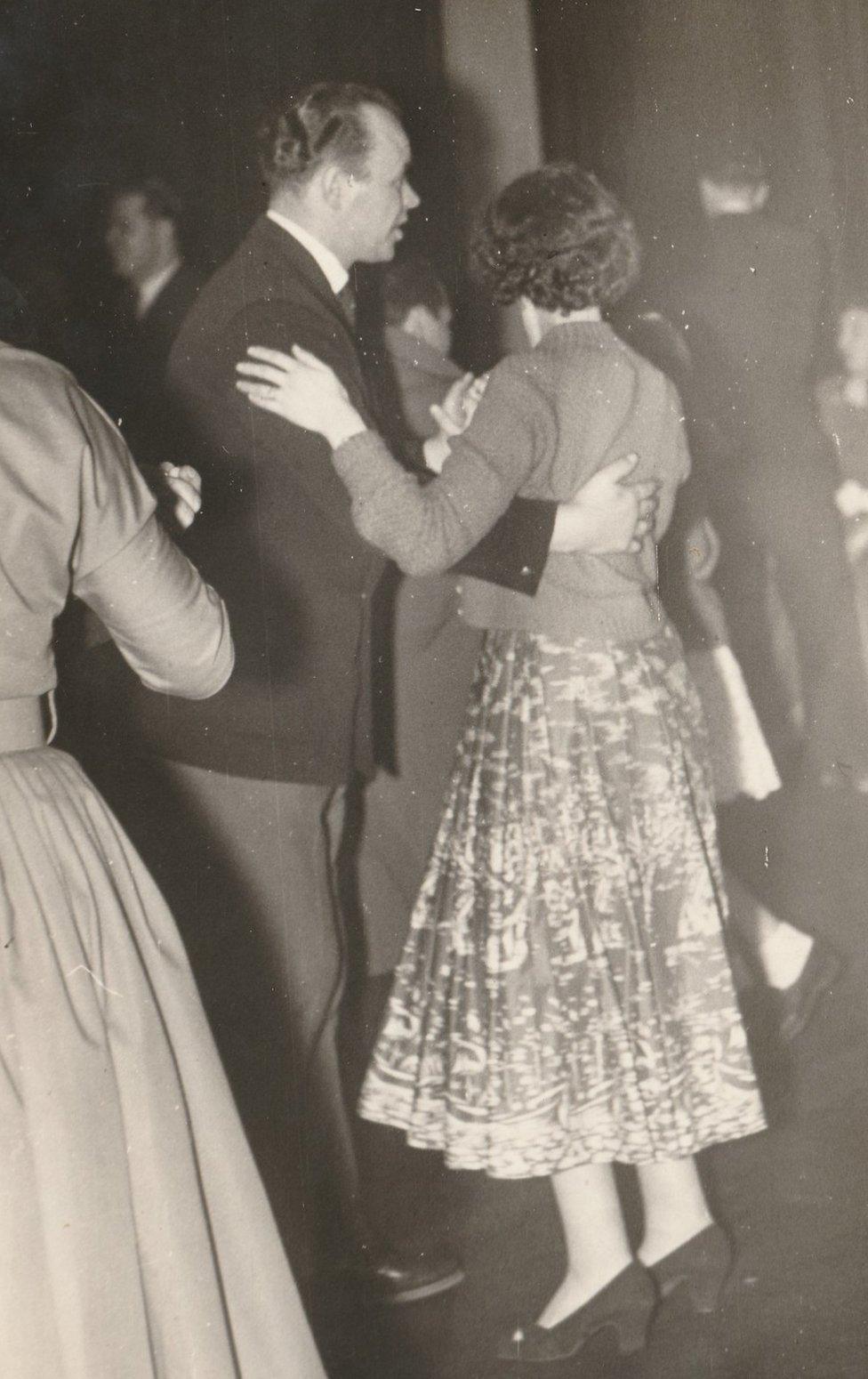 Couple dancing at Palais