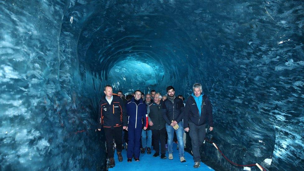 Emmanuel Macron visits Mer de Glace glacier with scientists and ministers