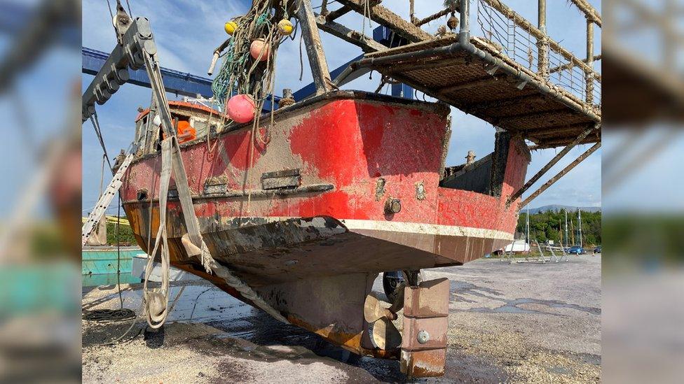 The Nicola Faith being landed ashore after recovery