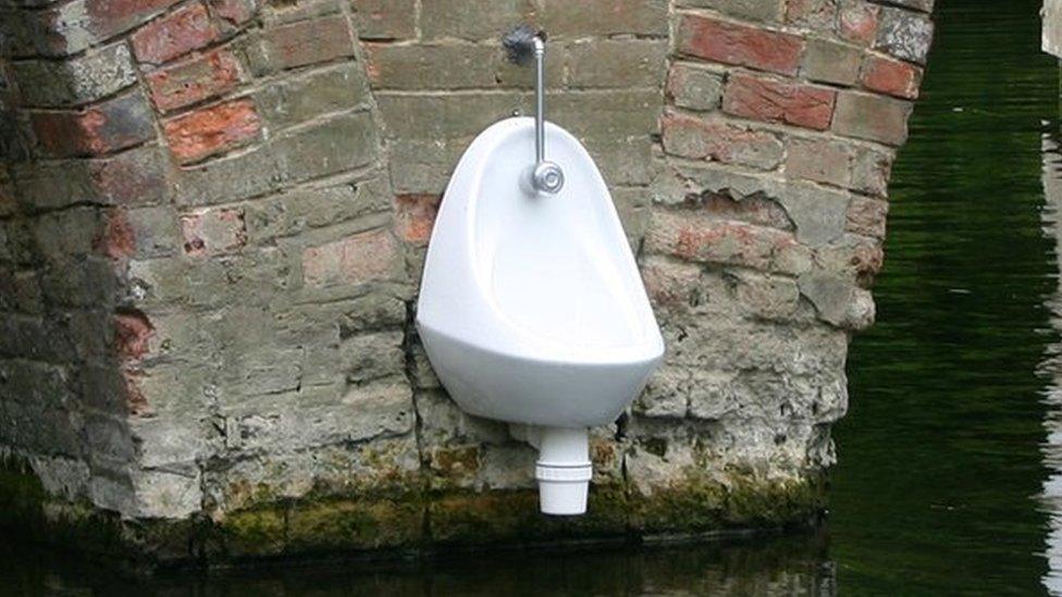 A urinal on the side of Sonning Bridge.