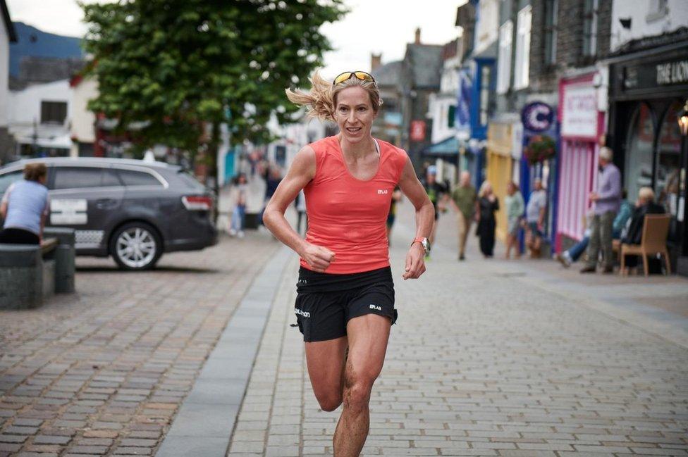 Beth Pascall running across one of the fells as part of the Bob Graham Round