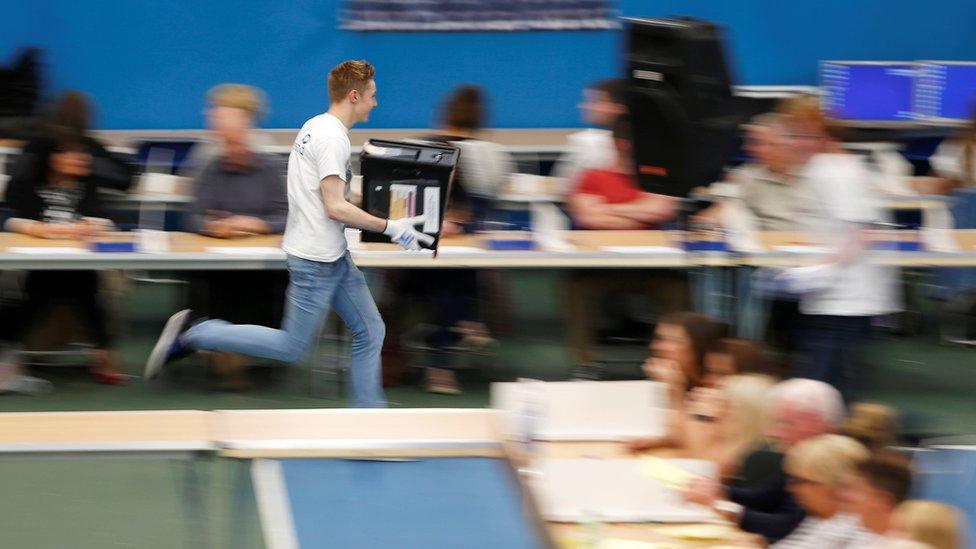 A ballot box is rushed into the counting centre for Britain's general election in Sunderland, 8 June 2017.