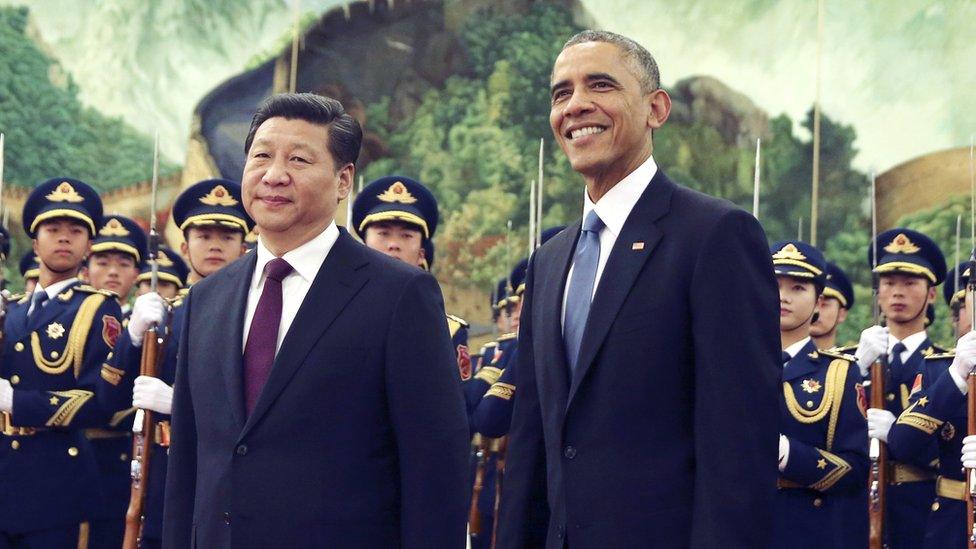 President Barack Obama smiling next to Xi Jinping, 2014