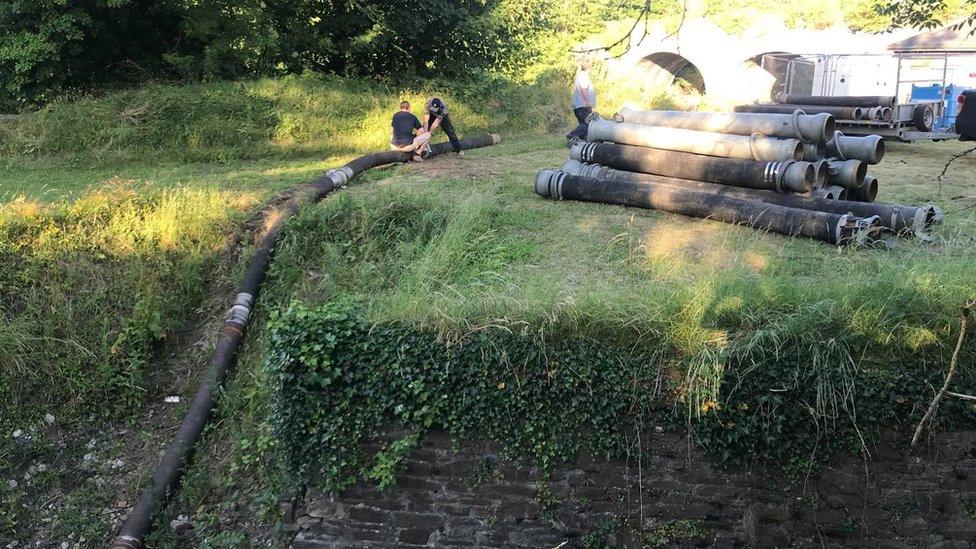 The pumps being fed into the canal