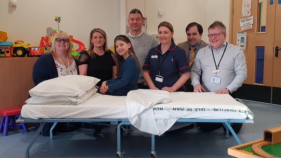 Chloe Rollitt and staff at Noble's Hospital children's ward