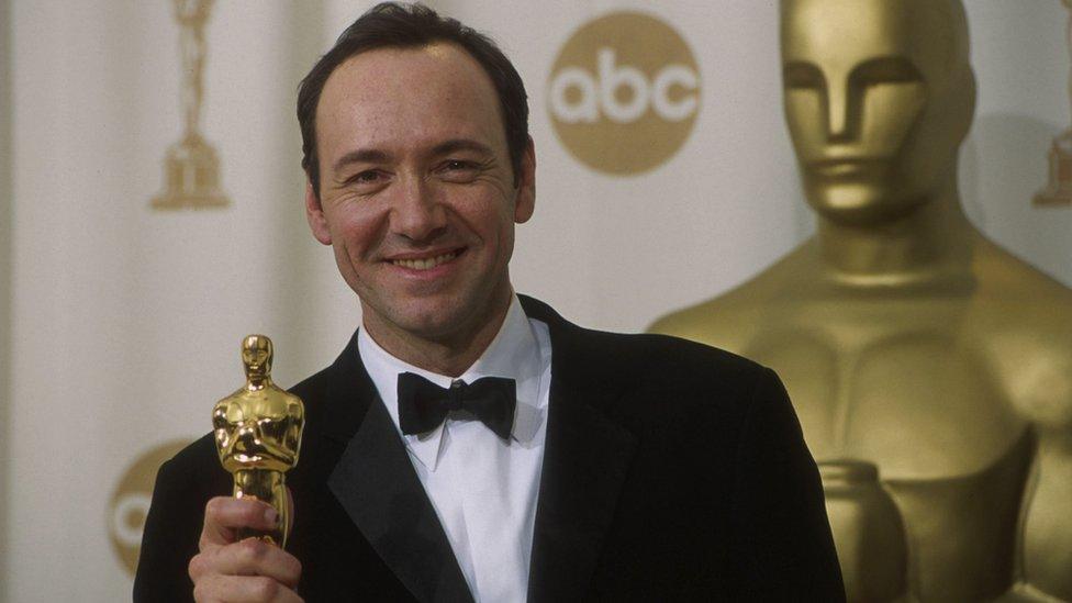 Kevin Spacey holds his Oscar for Best Actor for his role in American Beauty in 2000.