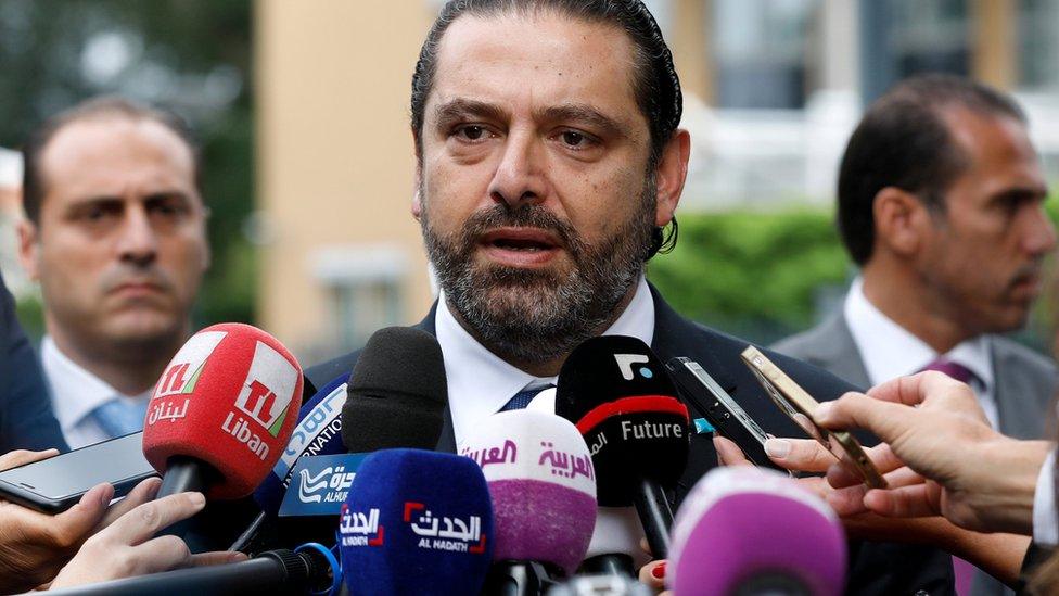 Lebanese Prime Minister Saad Hariri speaks to the media outside the Special Tribunal for Lebanon (STL) in The Hague (11 September 2018)