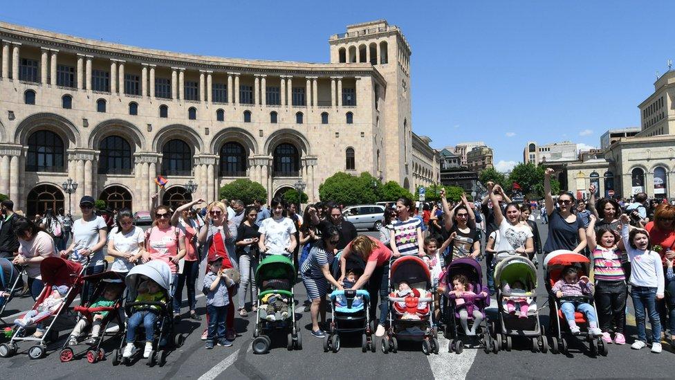 Women with pushchairs join protests in Yerevan on 2 May 2018