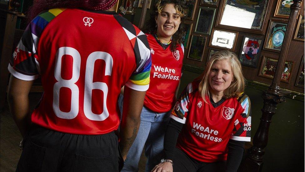 Players for the Hackney Women's Football Club model the new kit