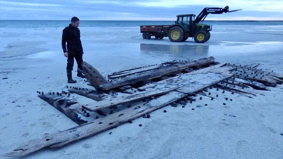 Wreckage with tractor in Sanday beach