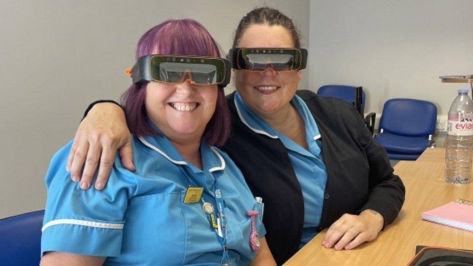 Nurses wearing the new virtual reality-style goggles