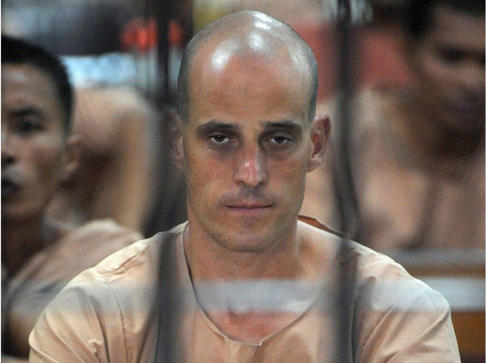 Australian Harry Nicolaides inside a holding cell while waiting for his trial at a court in Bangkok on 19 January 2009.