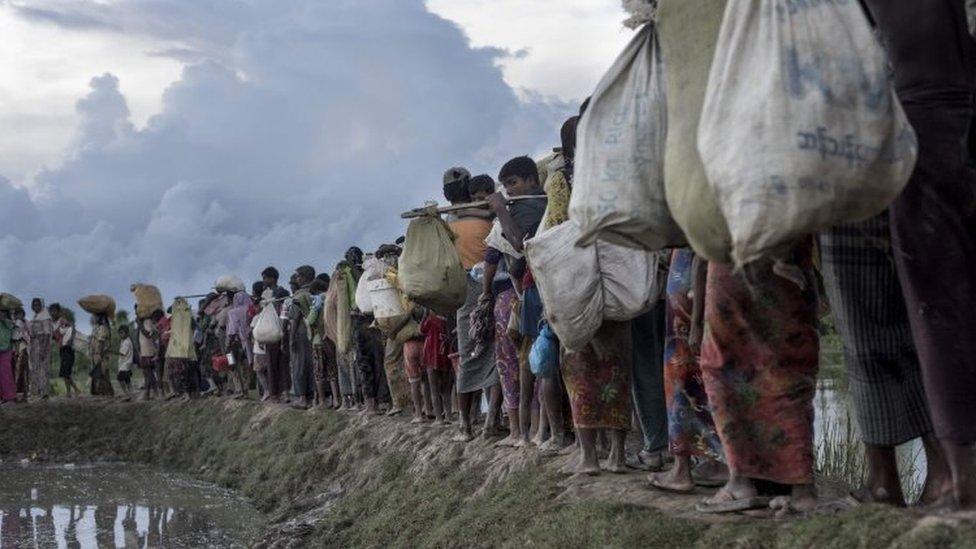 Rohingya refugees after crossing the Naf river from Myanmar into Bangladesh (09 October 2017)