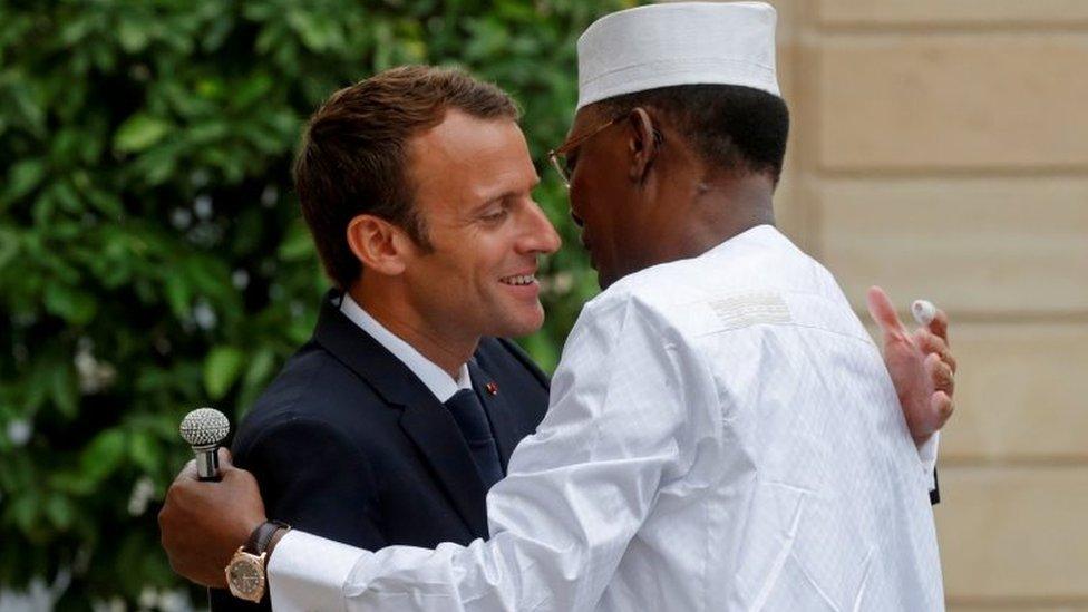 President Macron of France and President Deby of Chad hug in Paris in 2018