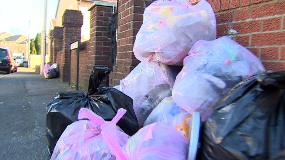 Waste bags on street