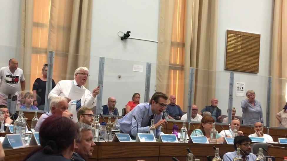 Councillors and angry residents in the public gallery at the Oldham Council meeting on 13 July