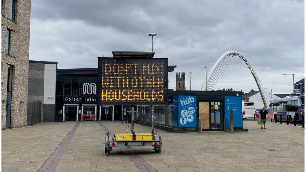 Warning signs in Bolton town centre