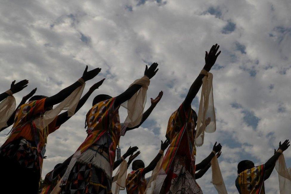 People performing at the Pope's Mass