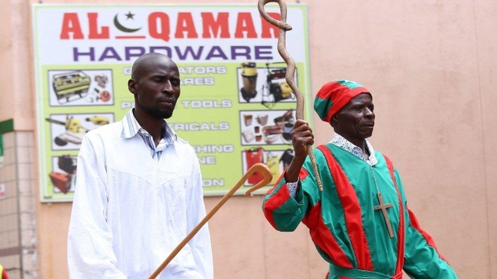 Supporters of the opposition party Movement for Democratic Change (MDC-T) march to join a protest against poverty and corruption, in Harare, Zimbabwe, 14 April 2016