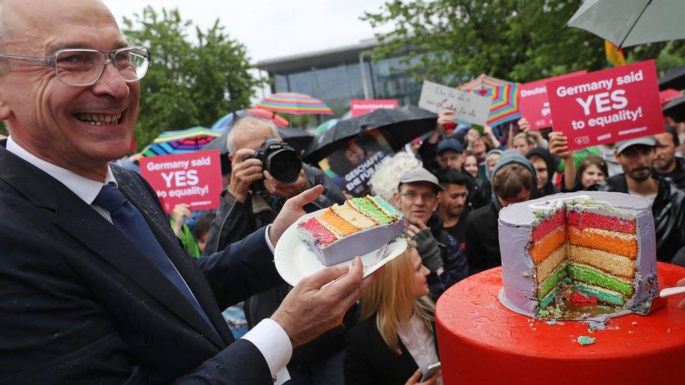 German Greens Party parliamentarian Volker Beck joins supporters of gay rights gathered outside the Chancellery to celebrate following a vote at the nearby Bundestag in which parliamentarians approved a new law legalizing gay marriage in Germany on June 30, 2017 in Berlin, Germany.