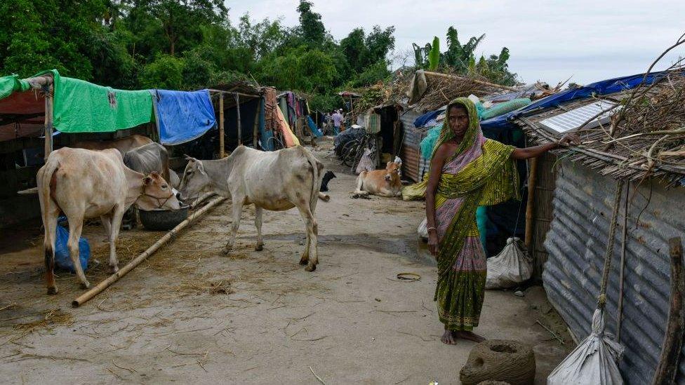 Makeshift shelter on a road in flood-hit Morigaon district of Assam state in northeast India