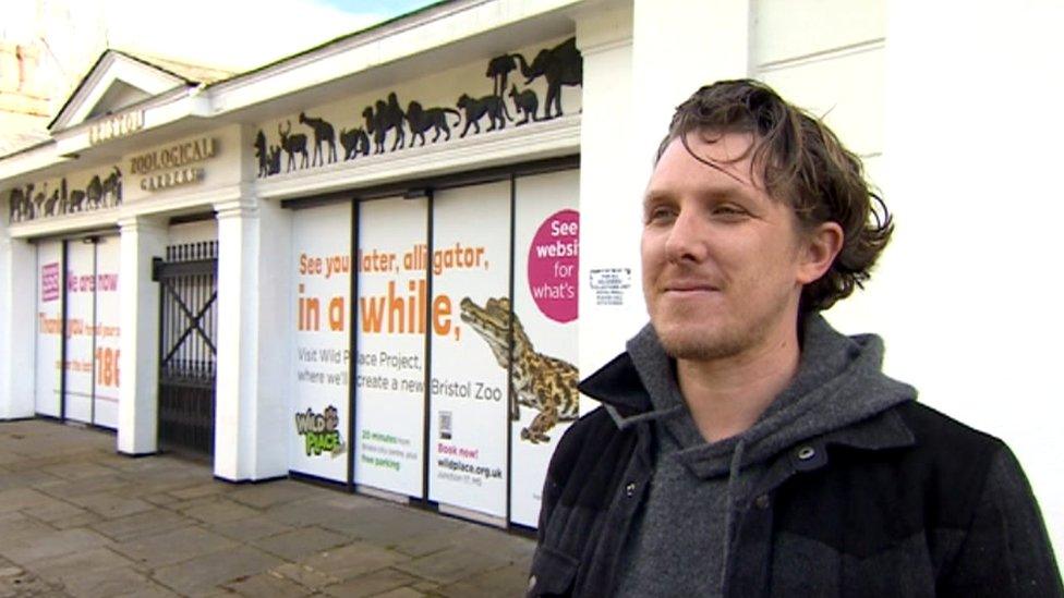 A man outside Bristol Zoo in Clifton