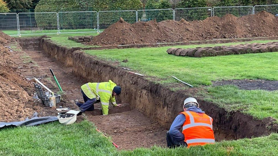 Archaeologists in the trenches