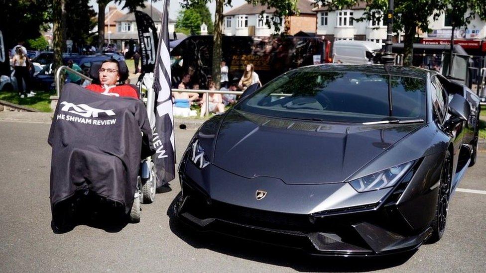 Shivam next to a Lamborghini