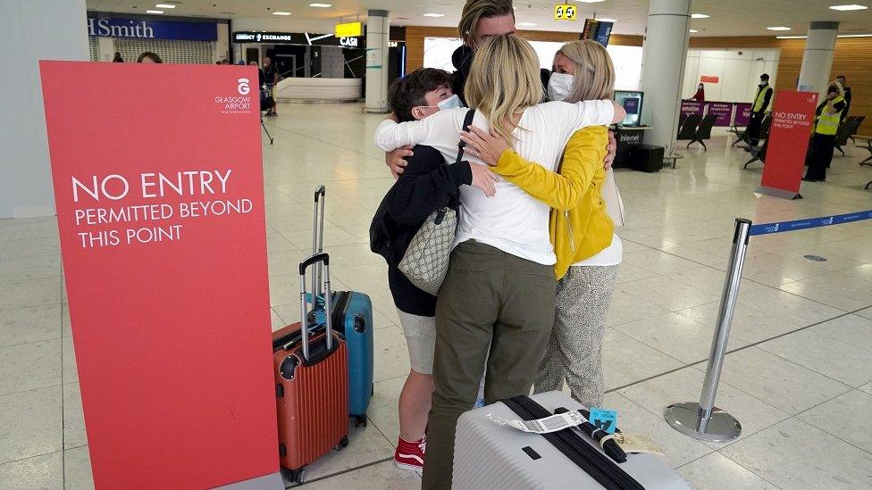 Family reunited at Glasgow airport