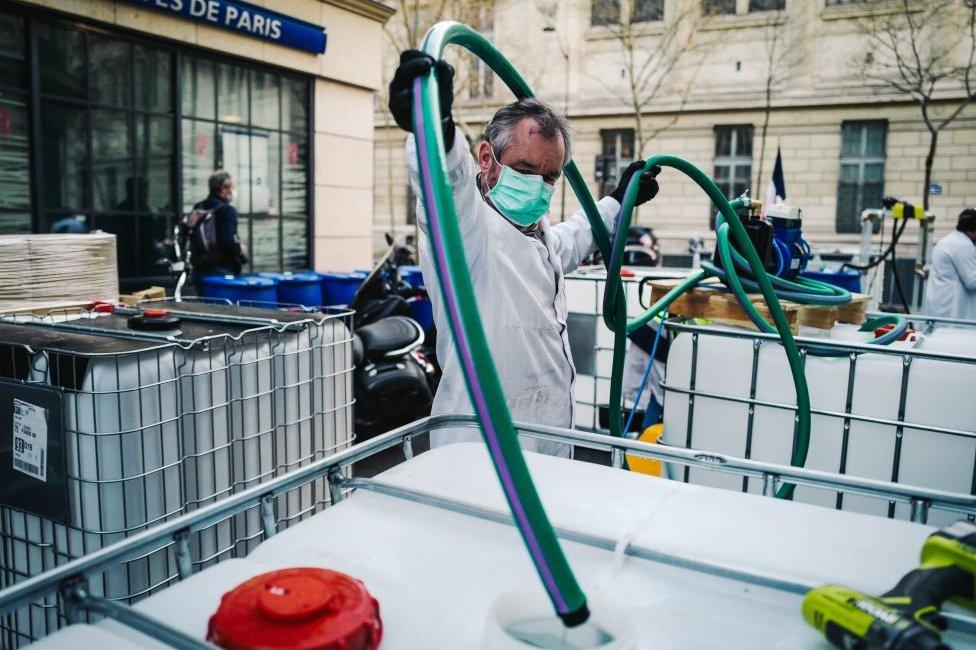 A pharmacy in Paris's Latin Quarter has started making sanitiser in the street