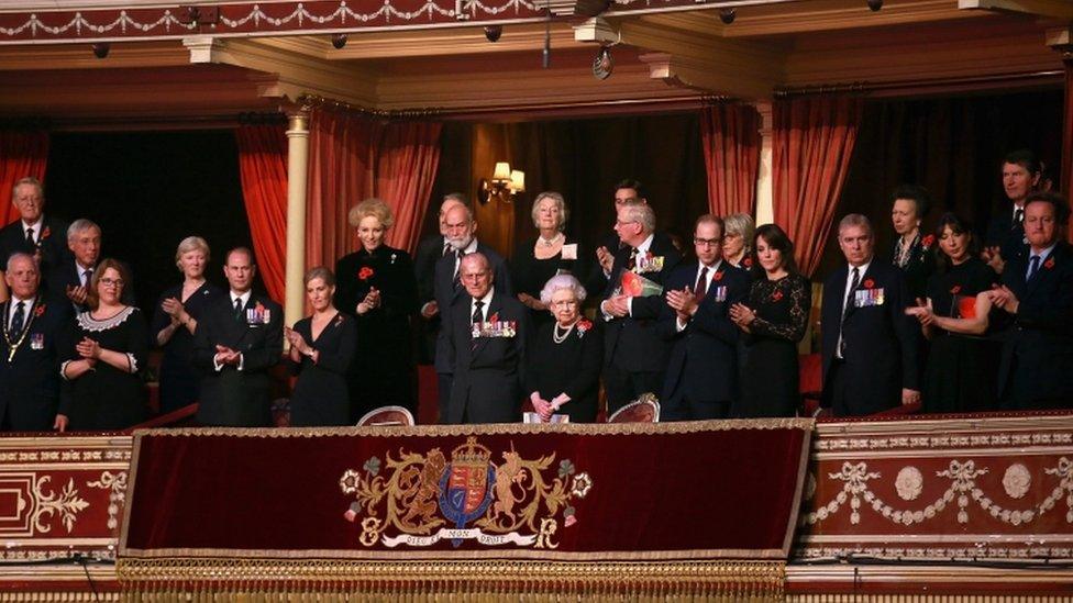 the Royal Box and guests stand as the Chelsea Pensioners arrive at the Royal Albert Hall