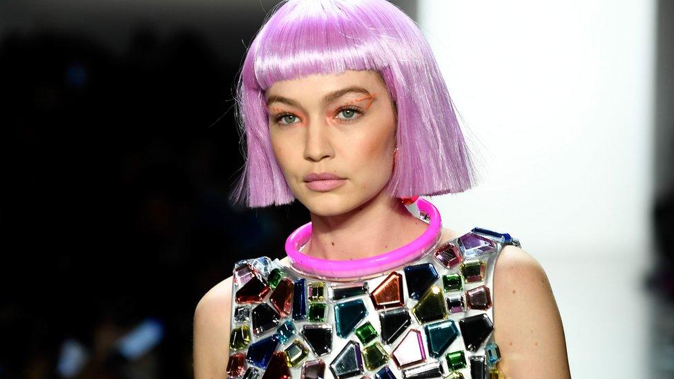 Gigi Hadid wearing a purple wig