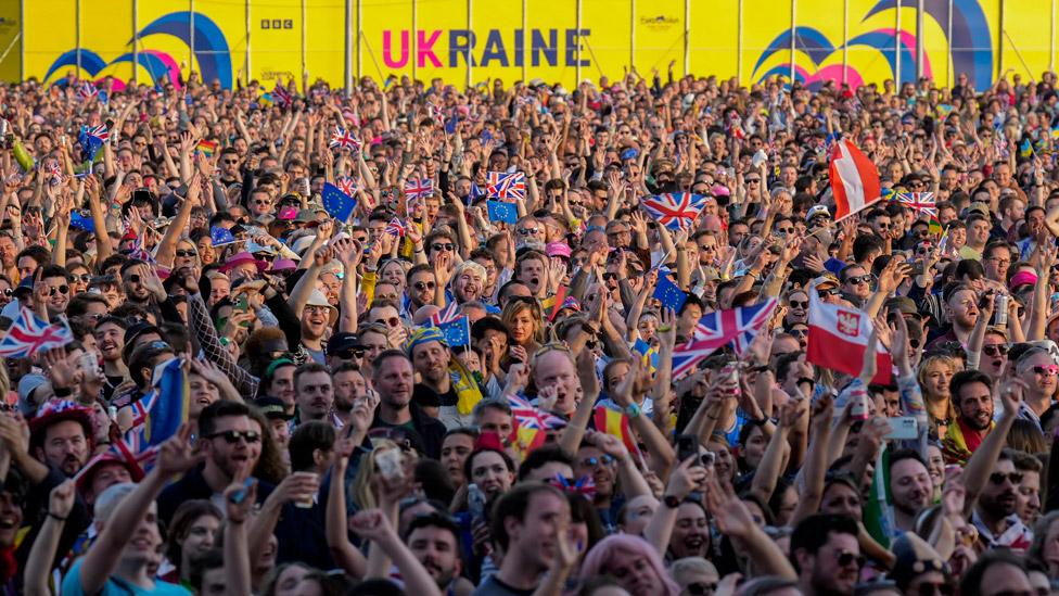 Eurovision fans watch the Eurovision Song Contest final on a giant screen in the Eurovision Village on May 13, 2023 in Liverpool