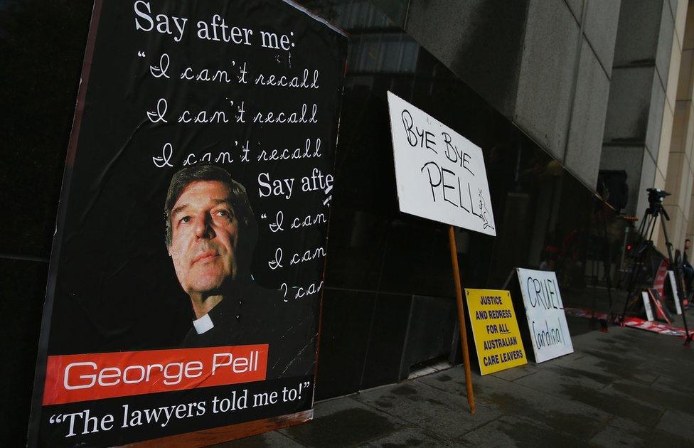 Signs left by protesters on March 24, 2014 in Sydney