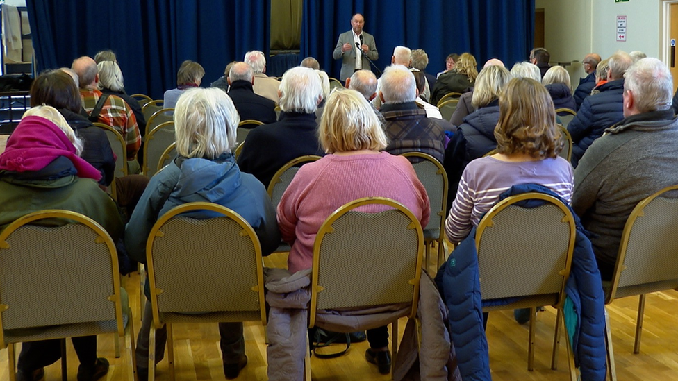 Crowds at a public meeting