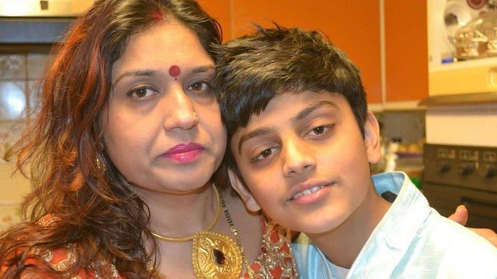 Seema Misra and her son