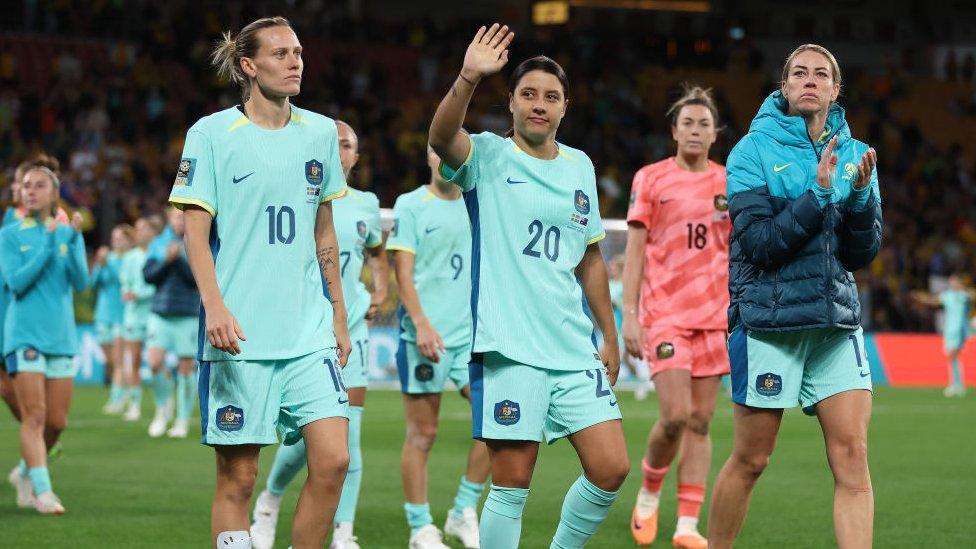 Australian team waving