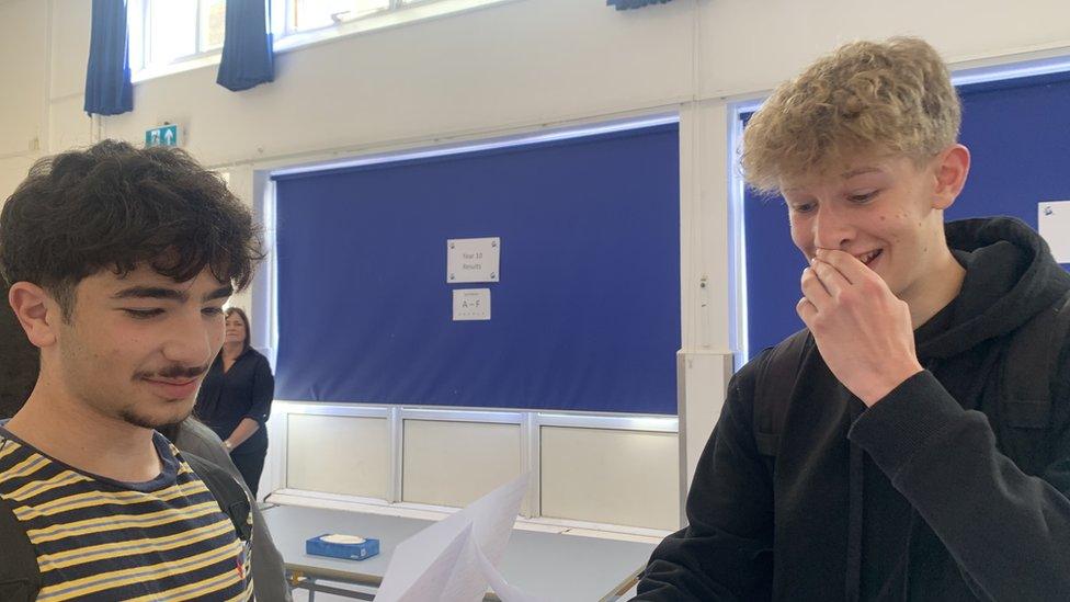 Ben, 15, (right) gets his results at Llanishen High School, Cardiff - including eight A* grades.