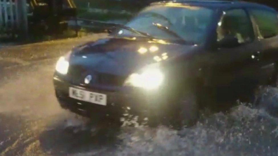 Car at level crossing